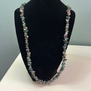 N28. Green stone necklace.